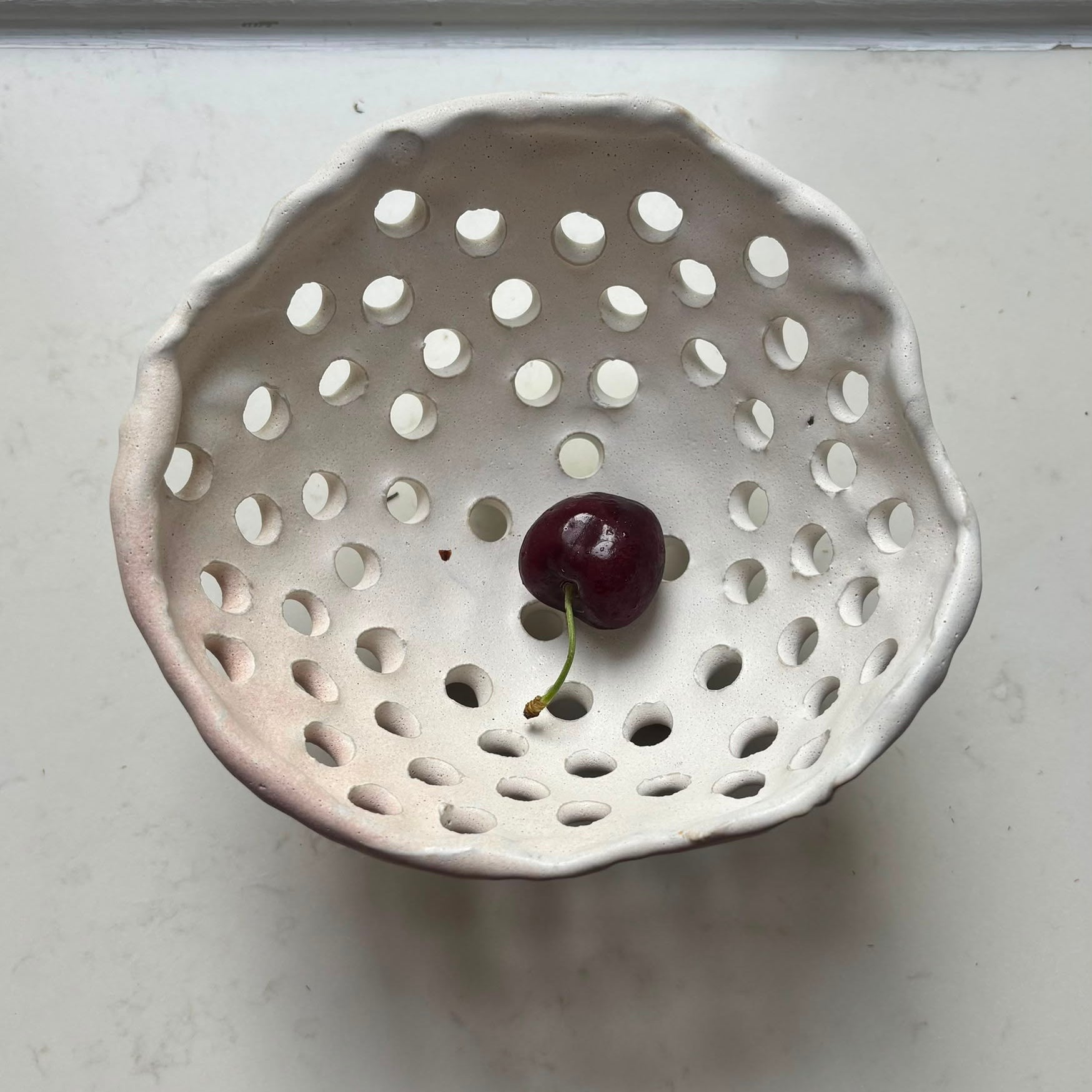 A. Mills Clay Colanders