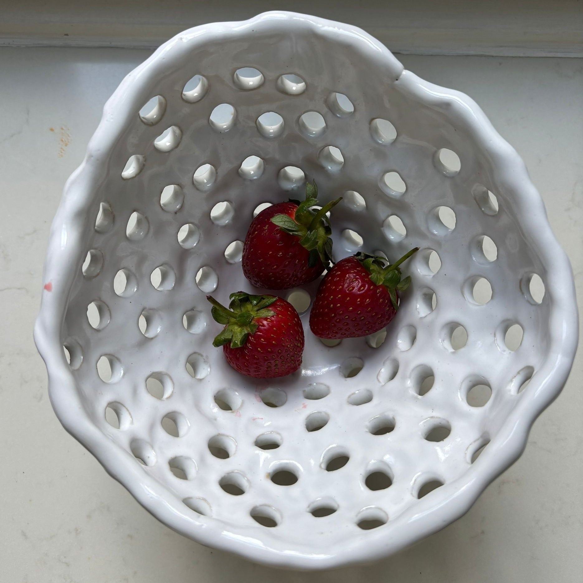 A. Mills Clay Colanders