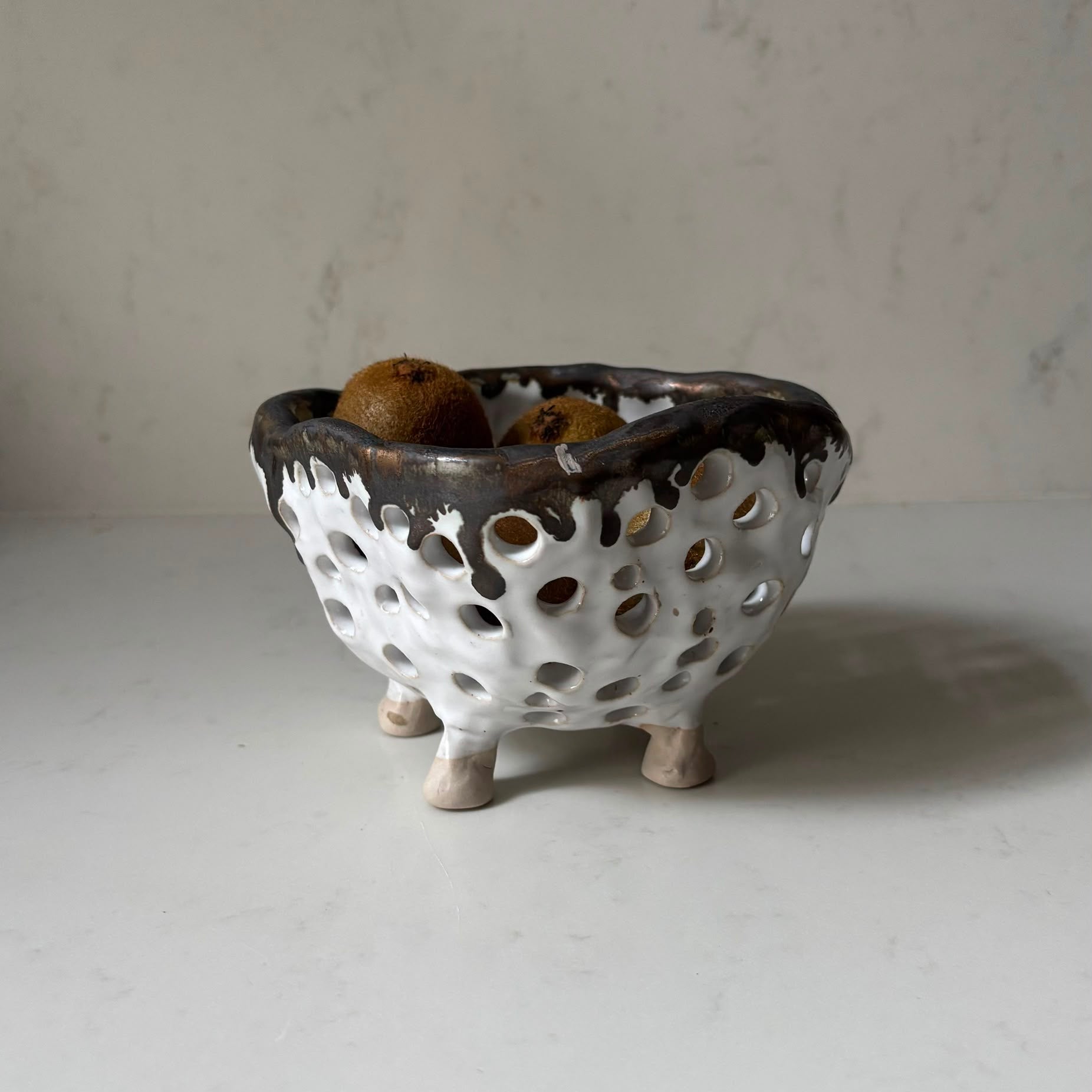 A. Mills Clay Colanders
