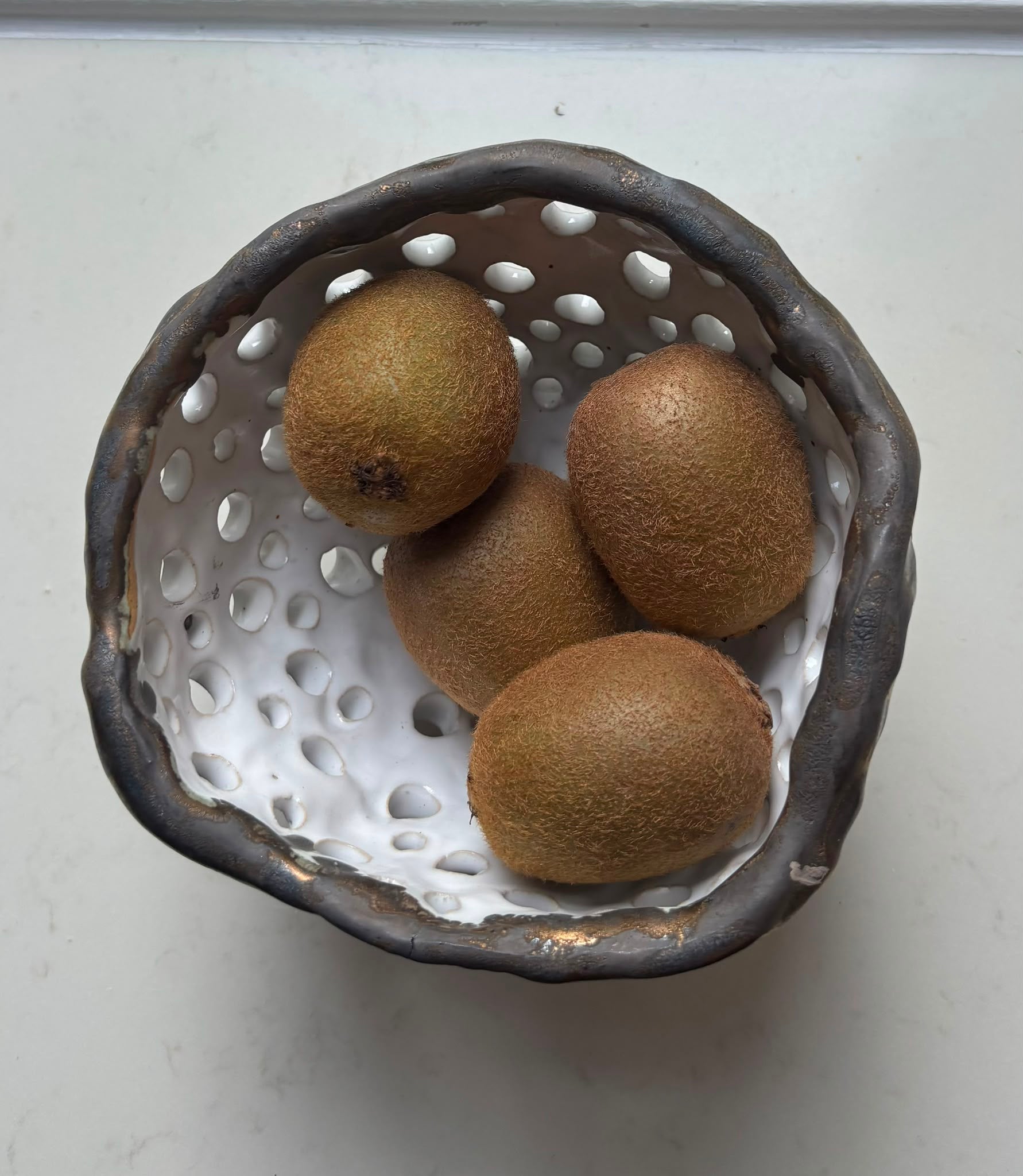 A. Mills Clay Colanders